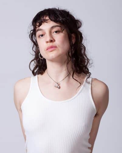 Image of performer looking straight at audience