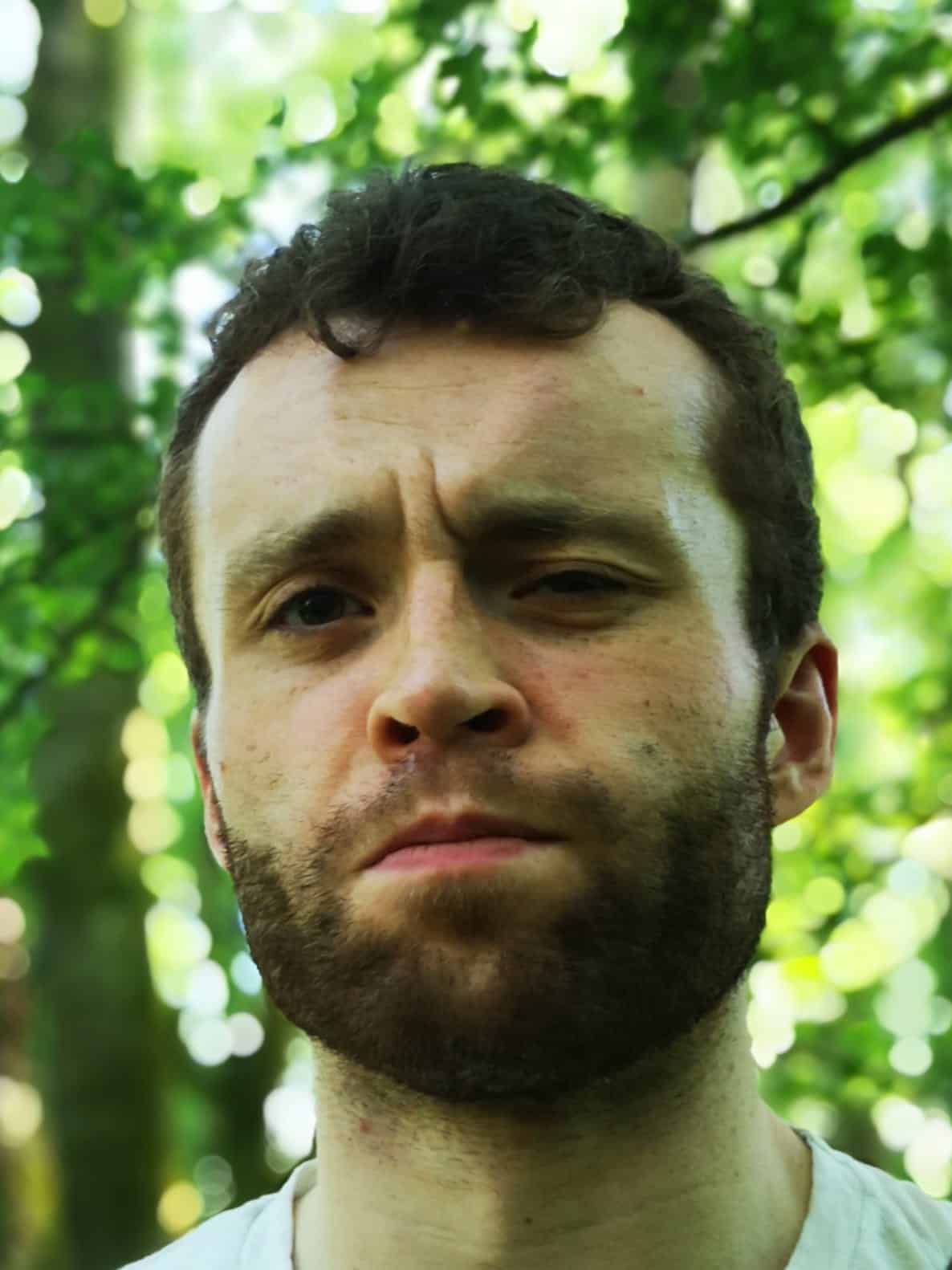 Portrait of a young man with a beard