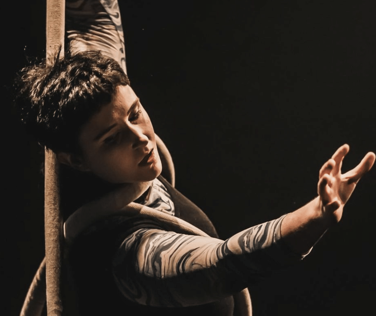 Em Murphy while performing acrobatics on rope